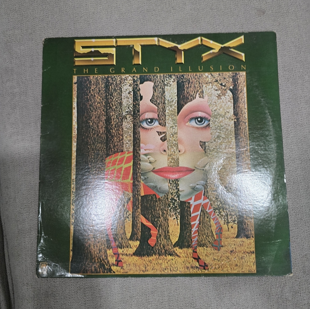 Unk Vinyl Record - The Grand Illusion